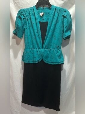 Lucky Barbara Teal Floral Peplum with an attachedBlack under piece and Skirt